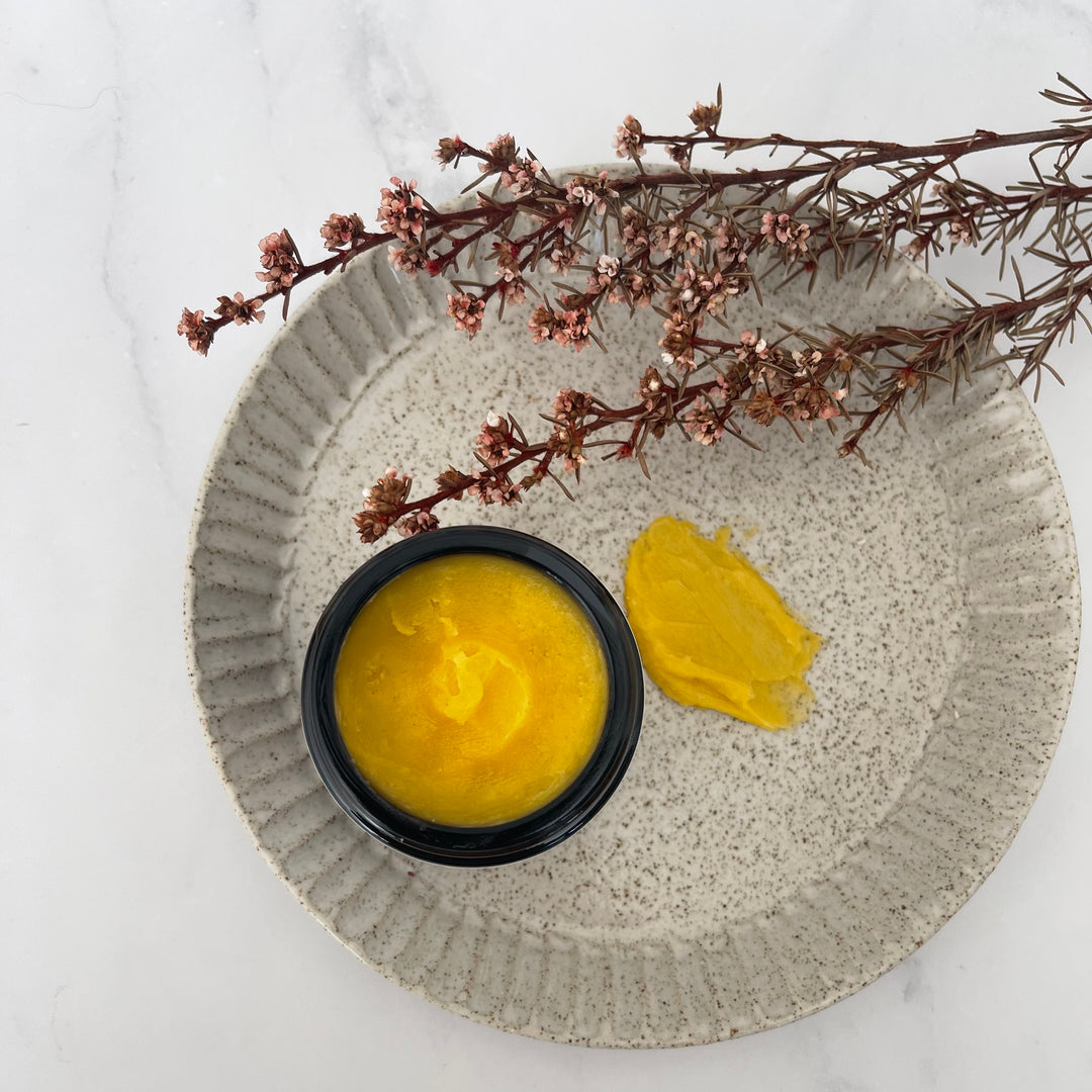 slow skincare ritual — sandalwood + neroli face cream in ceramic dish